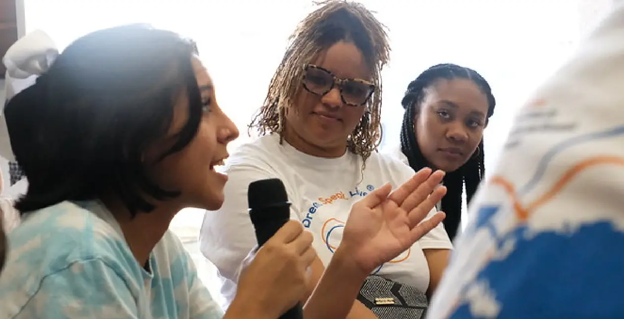 lady speaking into microphone